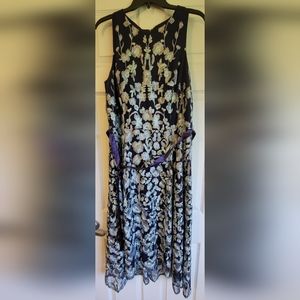 Sleeveless blue iridescent floral midi dress